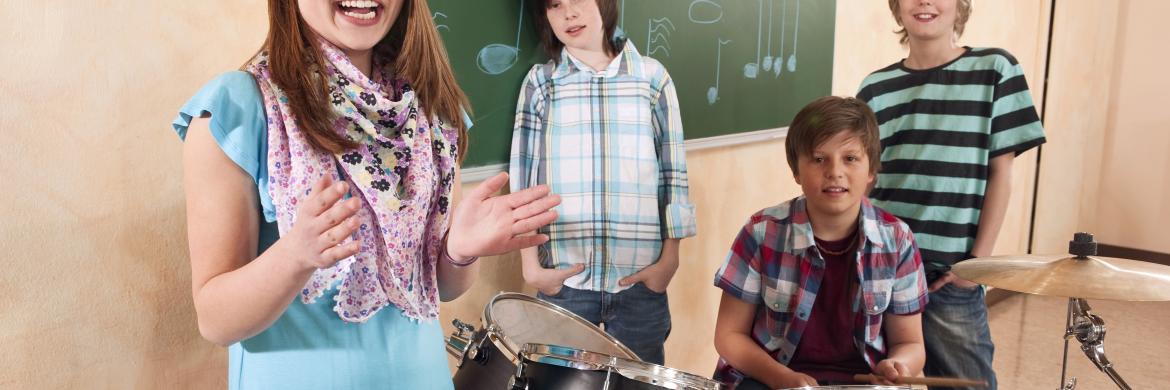 Classroom music teacher with kids in a class