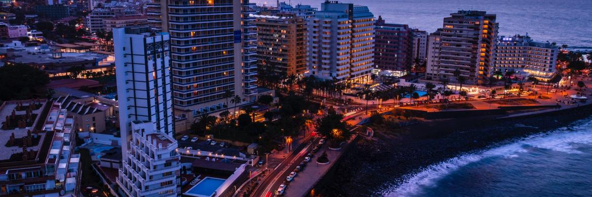 Coast road and high rise buildings,  Puerto de la Cruz, Canary Islands