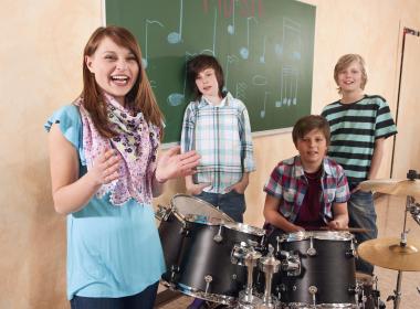 Classroom music teacher with kids in a class