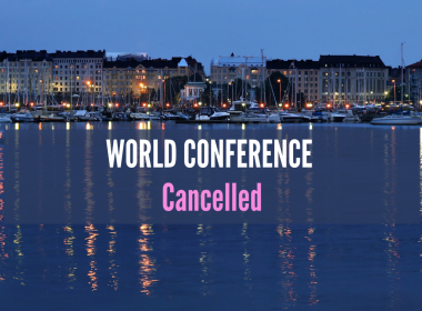 Helsinki wharf at night with words World Conference cancelled