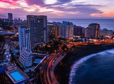 Coast road and high rise buildings,  Puerto de la Cruz, Canary Islands